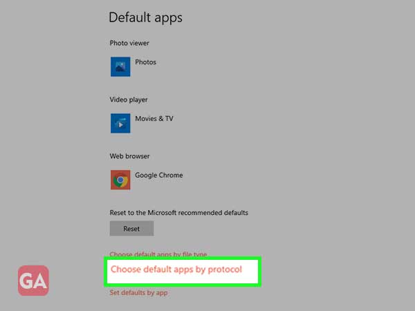 Go back to ‘Default apps’ section and click on ‘Choose default apps by protocol’ from the bottom