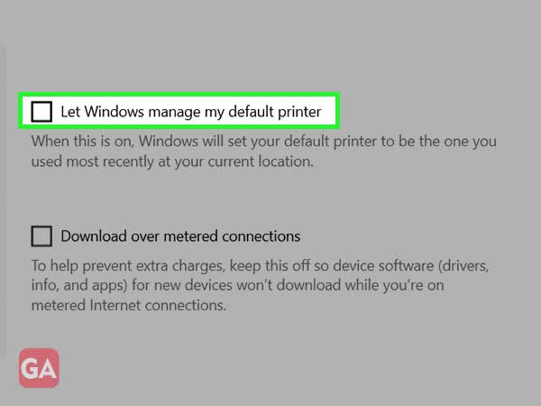 Uncheck the box that says ‘Let Windows manage my default printer’