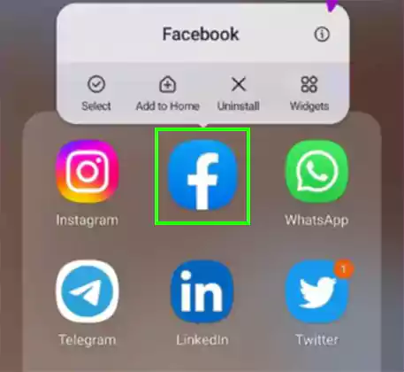 Tap and hold the Facebook app icon
