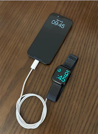 Charging the watch with the help of an iPhone